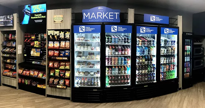 TCCs self service convienice store with various snacks, drinks, and refrigerated meal options.