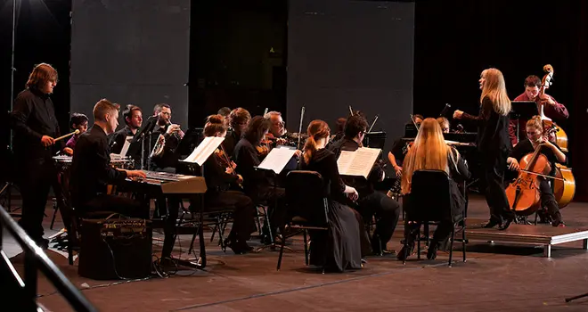 tcc students rehearse as members of instrumental ensemble