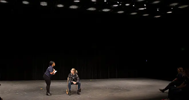 Two students act out a student written script at the Writer’s Alternative Trial Theatre (WATT Festival)