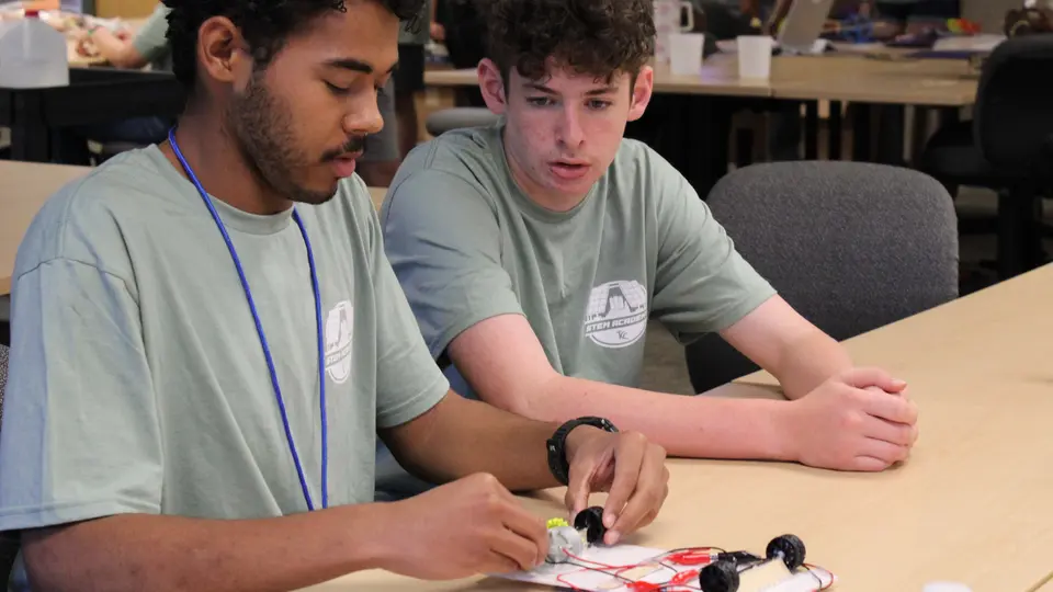 Students works on solar-powered vehicle